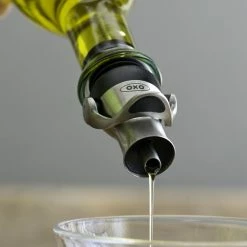 OXO Bottle Stopper & Pourer -HOMEKEEPING Shop oxo bottle stopper pourer 202240 0101 oxo bottle stopper pourer z