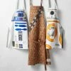 Star Wars™ Adult & Kids Aprons 1 Star Wars™ Adult & Kids Aprons -HOMEKEEPING Shop star wars aprons 202231 0076 star wars adult kid aprons z