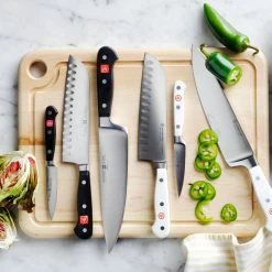 Wüsthof Classic Hollow-Ground Santoku Knife 22 Wüsthof Classic Hollow-Ground Santoku Knife -HOMEKEEPING Shop wusthof classic hollow ground santoku knife 202235 0023 wusthof classic demi bolster 3 1 2 paring knife z